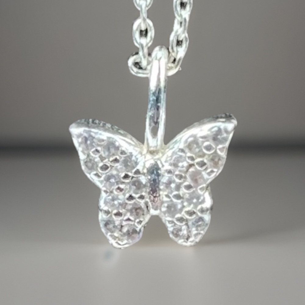 Beautiful delicate, silvertone solid / bling, butterfly pendant necklace